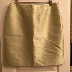 Tahari light green lined skirt with small slit. Medium, below knee. 4/$20